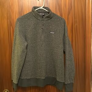 Patagonia women’s ¼ zip pullover.  Dark gray fleece size large